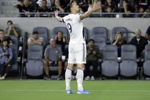 Los Angeles Galaxy's Zlatan Ibrahimovic (9) celebrates after scoring against Los Angeles FC during the first half of an MLS soccer match Sunday, Aug. 25, 2019, in Los Angeles. (AP Photo/Marcio Jose Sanchez)