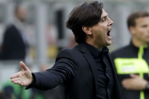 AC Milan head coach Vincenzo Montella shouts to his players during a Serie A soccer match between AC Milan and Genoa, at the San Siro stadium in Milan, Italy, Sunday, Oct. 22, 2017. (AP Photo/Luca Bruno)
