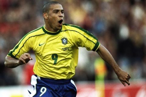 16 Jun 1998:  Ronaldo of Brazil celebrates after scoring in the World Cup group A game against Morocco at the Stade de la Beaujoire in Nantes, France. Brazil won 3-0. \ Mandatory Credit: Clive Brunskill /Allsport