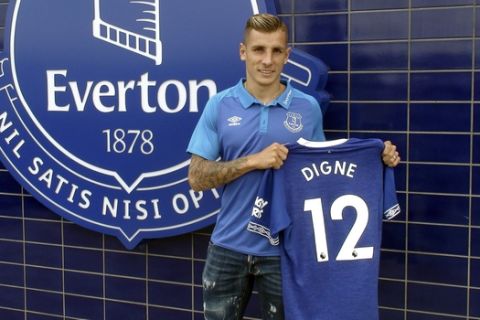 New Everton signing Lucas Digne poses for a photo after a press conference at USM Finch Farm, Liverpool, England, Friday, Aug. 3, 2018.  France left back Lucas Digne has joined Everton from Barcelona as the second signing of recently hired manager Marco Silva. (Eleanor Crooks/PA via AP)