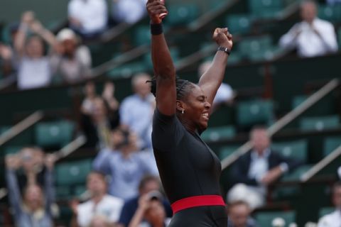 Serena Williams of the U.S. celebrates winning her second round match of the French Open tennis tournament against Australia's Ashleigh Barty in three sets, 3-6, 6-3, 6-4, at the Roland Garros stadium in Paris, France, Thursday, May 31, 2018. (AP Photo/Thibault Camus)