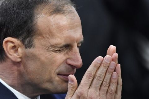 Juventus coach Massimiliano Allegri gestures as stands on the touchline during the Champions League quarterfinal, first leg, soccer match between Ajax and Juventus at the Johan Cruyff ArenA in Amsterdam, Netherlands, Wednesday, April 10, 2019. (AP Photo/Martin Meissner)