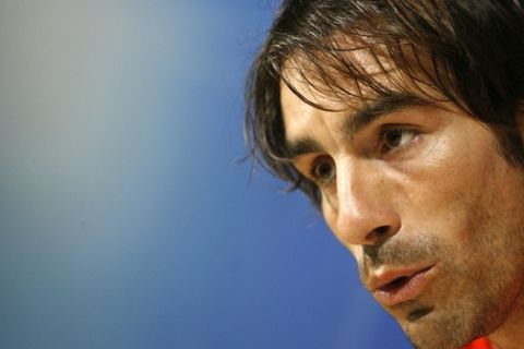 Villarreal's Robert Pires speaks during a news conference ahead of their Champions League quarter-finals first leg soccer match against Arsenal at the Madrigal stadium in Villarreal, Spain, on Monday, April 6, 2009.(AP Photo/Alberto Saiz)