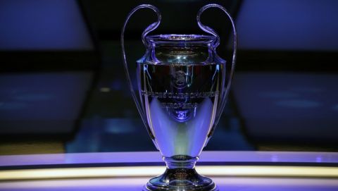The Champions League trophy is displayed before the UEFA group stage draw at the Grimaldi Forum, in Monaco, Thursday, Aug. 29, 2019. (AP Photo/Daniel Cole)