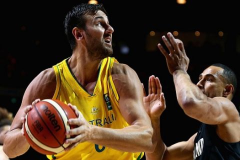 MELBOURNE, AUSTRALIA - AUGUST 15:  Andrew Bogut of the Boomers drives to the basket during the game one match between the Australian Boomers and New Zealand Tall Blacks at Rod Laver Arena on August 15, 2015 in Melbourne, Australia.  (Photo by Robert Prezioso/Getty Images)