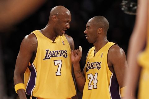 Los Angeles Lakers forward Lamar Odom, left and guard Kobe Bryant talk during a break against the Phoenix Suns during the first half of Game 5 of the NBA basketball Western Conference finals Thursday, May 27, 2010, in Los Angeles. (AP Photo/Chris Carlson) 