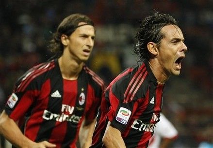 -- RETRANSMISSION OF MIL101 TO PROVIDE DIFFERENT CROP --  AC Milan forward Filippo Inzaghi celebrates with his teammate Zlatan Ibrahimovic, of Sweden, after scoring during a Serie A soccer match between AC Milan and Catania at the San Siro stadium in Milan, Italy, Saturday , Sept. 18, 2010. (AP Photo/Luca Bruno)