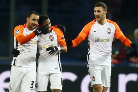 Shakhtar's Ismaily, left, celebrates with his teammates after scoring his side's second goal during the Champions League group F soccer match between Manchester City and Shakhtar Donetsk at the Metalist Stadium in Kharkiv, Ukraine, Wednesday, Dec. 6, 2017. (AP Photo/Efrem Lukatsky)