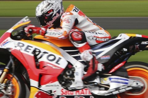 Repsol Honda's Marc Marquez of Spain, during a practice session ahead of the MOTO British Grand Prix at Silverstone racetrack Friday Aug. 25, 2017. (David Davies/PA via AP)