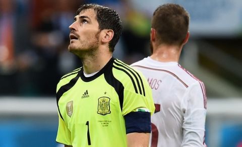 SALVADOR, BRAZIL - JUNE 13: Iker Casillas of Spain reacts after allowing a goal in the second half during the 2014 FIFA World Cup Brazil Group B match between Spain and Netherlands at Arena Fonte Nova on June 13, 2014 in Salvador, Brazil.  (Photo by David Ramos/Getty Images)