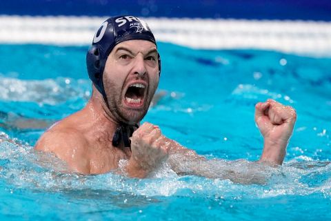 Serbia's Filip Filipovic celebrates after scoring a goal against Italy during a quarterfinal round men's water polo match at the 2020 Summer Olympics, Wednesday, Aug. 4, 2021, in Tokyo, Japan. (AP Photo/Mark Humphrey)