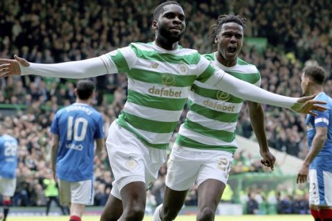 Celtic's Odsonne Edouard celebrates scoring his side's first goal during the Scottish Premiership soccer match between Celtic and Rangers at Celtic Park, in Glasgow, Scotland, Sunday April 29, 2018. Celtic have won the Scottish Premiership league.  (Jane Barlow/PA via AP)
