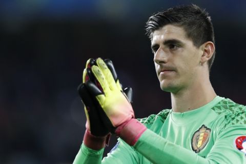 Belgium goalkeeper Thibaut Courtois applauds fans at the end of the Euro 2016 quarterfinal soccer match between Wales and Belgium, at the Pierre Mauroy stadium in Villeneuve dAscq, near Lille, France, Friday, July 1, 2016. Wales won 3-1. (AP Photo/ Michel Spingler)