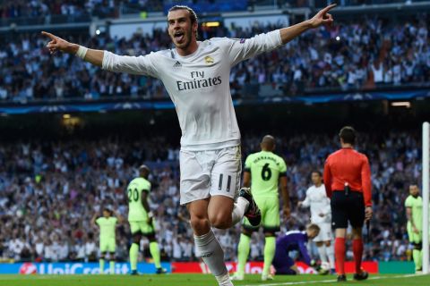 "MADRID, SPAIN - MAY 04:  Gareth Bale of Real Madrid celebrates scoring the opening goal during the UEFA Champions League semi final, second leg match between Real Madrid and Manchester City FC at Estadio Santiago Bernabeu on May 4, 2016 in Madrid, Spain.  (Photo by David Ramos/Getty Images )"