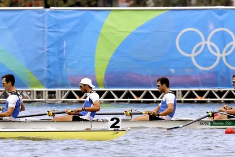Dionysios Angelopoulos, Ioannis Tsilis, Georgios Tziallas, and Ioannis Christou, of Greece, compete in the men's rowing four heat during the 2016 Summer Olympics in Rio de Janeiro, Brazil, Monday, Aug. 8, 2016. (AP Photo/Luca Bruno)