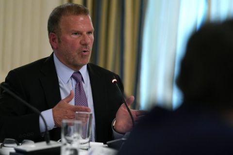 Tilman Fertitta, chairman and CEO of Landry's Inc., speaks during a meeting with restaurant industry executives about the coronavirus response, in the State Dining Room of the White House, Monday, May 18, 2020, in Washington. (AP Photo/Evan Vucci)
