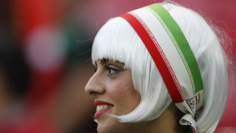 Iranian soccer fan wait for the start of the group B match between Iran and Spain at the 2018 soccer World Cup in the Kazan Arena in Kazan, Russia, Wednesday, June 20, 2018. (AP Photo/Frank Augstein)