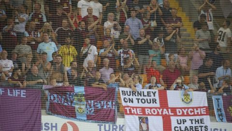 Burnley's fans support their team during the Europa League qualification soccer match between Istanbul Basaksehir and Burnley, at the Fatih Terim stadium in Istanbul, Thursday, Aug. 9, 2018. (AP Photo)