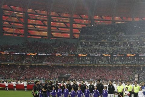 Arsenal and Chelsea teams line up for the anthems before the Europa League Final soccer match between Arsenal and Chelsea at the Olympic stadium in Baku, Azerbaijan, Wednesday, May 29, 2019. (AP Photo/Luca Bruno)