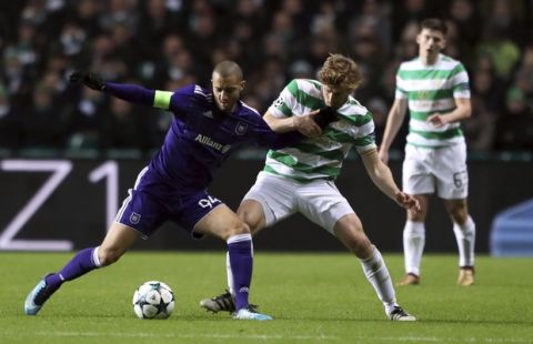 Celtic's Stuart Armstrong, right, and Anderlecht's Sofiane Hanni,  in action during their UEFA Champions League soccer match at Celtic Park, Glasgow, Scotland, Tuesday Dec. 5, 2017. (Andrew Milligan/PA via AP)