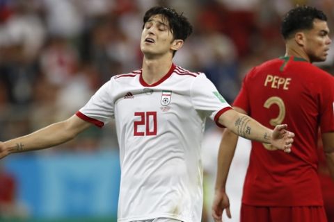 Iran's Sardar Azmoun reacts during the group B match between Iran and Portugal at the 2018 soccer World Cup at the Mordovia Arena in Saransk, Russia, Monday, June 25, 2018. (AP Photo/Pavel Golovkin)