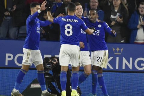 Leicester's Harvey Barnes, second right, celebrates after scoring the opening goal during the English Premier League soccer match between Leicester City and West Ham Utd at the King Power Stadium in Leicester, England, Wednesday, Jan. 22, 2020. (AP Photo/Rui Vieira)