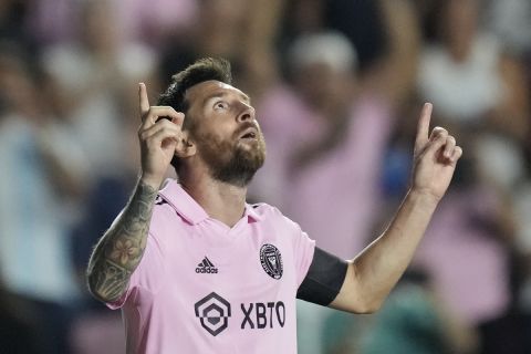 Inter Miami forward Lionel Messi (10) celebrates after scoring his side's third goal against Orlando City during the second half of a Leagues Cup soccer match, Wednesday, Aug. 2, 2023, in Fort Lauderdale, Fla. (AP Photo/Rebecca Blackwell)