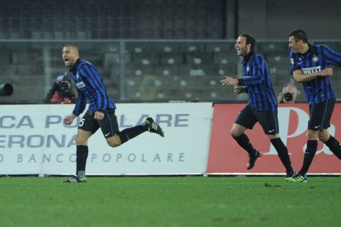 Inter Milan's Argentine defender Adrian Samuel (L) celebrates during the Italian serie A football match Chievo Verona against Inter Milan on March 9, 2012, in Verona stadium. AFP PHOTO / OLIVIER MORIN (Photo credit should read OLIVIER MORIN/AFP/Getty Images)