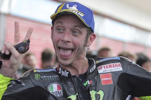 Valentino Rossi of Italy celebrates after coming in second in the Moto GP race at the Termas de Rio Hondo circuit in Argentina, Sunday, March 31, 2019. (AP Photo/Nicolas Aguilera)