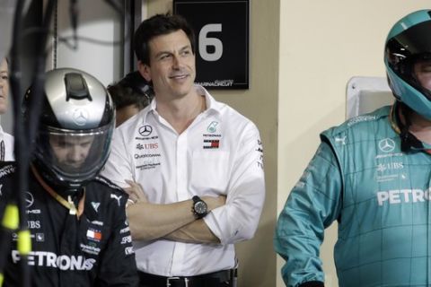 Mercedes team manager Toto Wolf smiles in the pit during the Emirates Formula One Grand Prix, at the Yas Marina racetrack in Abu Dhabi, United Arab Emirates, Sunday, Dec.1, 2019. (AP Photo/Luca Bruno/Pool)