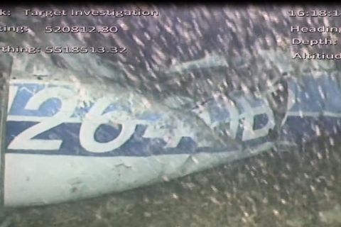 In this image released Monday Feb. 4, 2019, by the UK Air Accidents Investigation Branch (AAIB) showing the rear left side of the fuselage including part of the aircraft registration N264DB that went missing carrying soccer player Emiliano Sala, when it disappeared from radar contact on Jan. 21 2019.  The Air accident investigators say one body is visible in the sea in the wreckage of the plane that went missing carrying soccer player Emiliano Sala and his pilot David Ibbotson. (AAIB via AP)