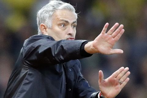 Manchester United head coach Jose Mourinho reacts during the English Premier League soccer match between Watford and Manchester United at Vicarage Road stadium in Watford, England, Saturday, Sept. 15, 2018.(AP Photo/Frank Augstein)