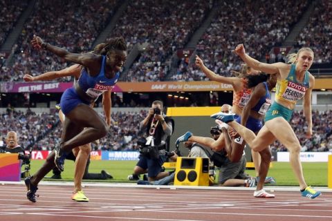 Australia's Sally Pearson crosses the line to win the gold in the women's 100-meter hurdles final during the World Athletics Championships in London Saturday, Aug. 12, 2017. (AP Photo/Matt Dunham)