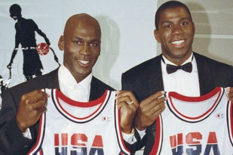 FILE - This Sept. 21, 1991 file photo shows Michael Jordan, left, and Earvin "Magic" Johnson holding their uniforms for the 1992 US Olympic Basketball team in Chicago. Cleveland Cavaliers star LeBron James knows who his dream teammates would be in a 3-on-3 competition at the 2020 Olympics _ Michael Jordan and Magic Johnson. James didnt think he would consider playing in the new Olympic event in the Tokyo Games, but is happy it was added. (AP Photo/Ralf-Finn Hestoft, file)