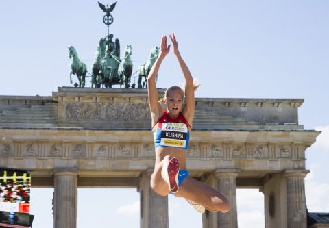 Darya Klishina of Russia competes in the Women's long jump during a four-countries pole vault and long jump team meeting in front of Brandenburg Gate in in Berlin, Germany, Saturday, Aug. 24, 2013. (AP Photo/Gero Breloer)