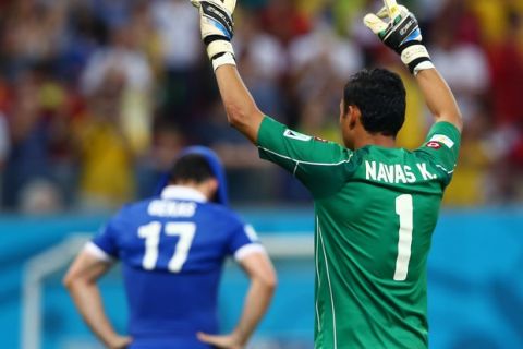 RECIFE, BRAZIL - JUNE 29: Keylor Navas of Costa Rica reacts after saving the penalty kick of Theofanis Gekas of Greece during the 2014 FIFA World Cup Brazil Round of 16 match between Costa Rica and Greece at Arena Pernambuco on June 29, 2014 in Recife, Brazil.  (Photo by Quinn Rooney/Getty Images)