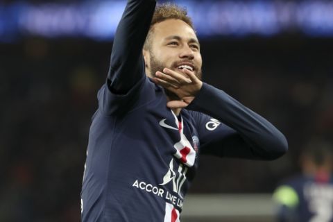 PSG's Neymar celebrates after scoring his side's second goal during the League One soccer match between Paris Saint Germain and Amiens, at the Parc des Princes stadium in Paris, Saturday, Dec. 21, 2019. (AP Photo/Thibault Camus)