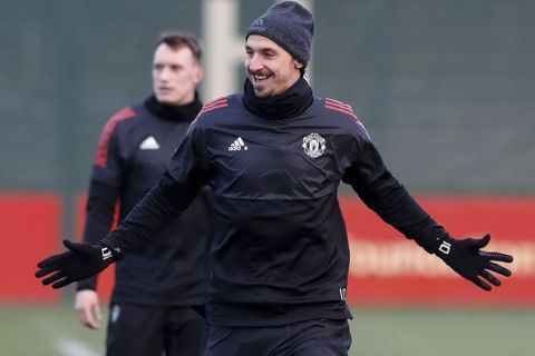 Manchester United's Zlatan Ibrahimovic  gestures during the training session at United's training complex in Manchester, England Monday Dec. 4, 2017.  United will play CSKA Moscow in a Champions League soccer match  on Tuesday.(Martin Rickett/PA via AP)