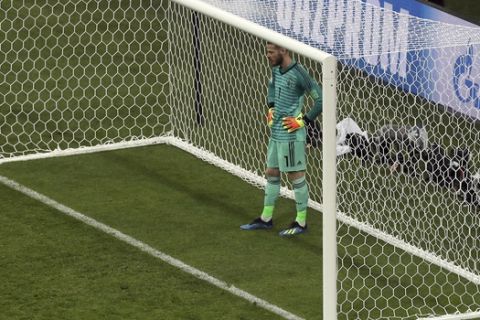 Spain goalkeeper David De Gea reacts after Portugal's Cristiano Ronaldo scored his side's 3rd goal during the group B match between Portugal and Spain at the 2018 soccer World Cup in the Fisht Stadium in Sochi, Russia, Friday, June 15, 2018. (AP Photo/Thanassis Stavrakis)