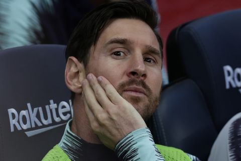 FC Barcelona's Lionel Messi sits on the bench prior of the Spanish La Liga soccer match between FC Barcelona and Athletic Bilbao at the Camp Nou stadium in Barcelona, Spain, Saturday, Sept. 29, 2018. (AP Photo/Manu Fernandez)