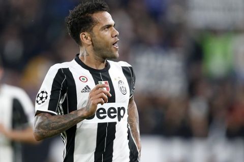 Juventus' Dani Alves celebrates after scoring during the Champions League semi final second leg soccer match between Juventus and Monaco in Turin, Italy, Tuesday, May 9, 2017. (AP Photo/Antonio Calanni)