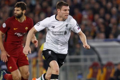 Liverpool's James Milner runs with the ball during the Champions League semifinal second leg soccer match between Roma and Liverpool at the Olympic Stadium in Rome, Wednesday, May 2, 2018. (AP Photo/Riccardo De Luca)