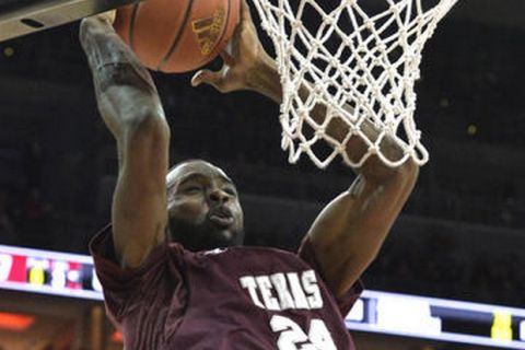 Texas Southern's Marvin Jones (24) goes in for a layup during the first half of an NCAA college basketball game against Louisville, Saturday, Dec. 10, 2016, in Louisville, Ky. (AP Photo/Timothy D. Easley)