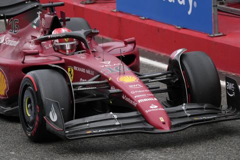 Ferrari driver Charles Leclerc of Monaco steers his car after stopping at pit during the Emilia Romagna Formula One Grand Prix, at the Enzo and Dino Ferrari racetrack, in Imola, Italy, Sunday, April 24, 2022. (AP Photo/Luca Bruno)