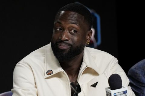 Dwyane Wade speaks during a news conference for the The Naismith Basketball Hall of Fame at the NCAA college basketball Tournament on Saturday, April 1, 2023, in Houston. (AP Photo/David J. Phillip)