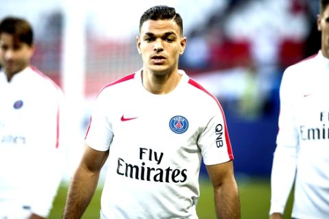 FILE - In this Aug.21, 2016 file photo, PSG's Hatem Ben Arfa walks during training session before the French League One soccer match between PSG and Metz at the Parc des Princes stadium in Paris. Frustrated by his lack of playing time, the former France winger has made clear he could look for another destination during the summer if his personal situation does not improve. (AP Photo/Kamil Zihnioglu, File)