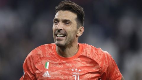 Juventus' goalkeeper Gianluigi Buffon celebrates at the end of a Serie A soccer match between Juventus and Bologna, at the Allianz stadium in Turin, Italy, Saturday, Oct.19, 2019. Juventus won 2-1. (AP Photo/Luca Bruno)