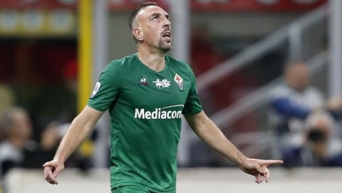 Fiorentina's Franck Ribery celebrates after scoring his side's third goal during a Serie A soccer match between AC Milan and Fiorentina, at the San Siro stadium in Milan, Italy, Sunday, Sept. 29, 2019. (AP Photo/Antonio Calanni)