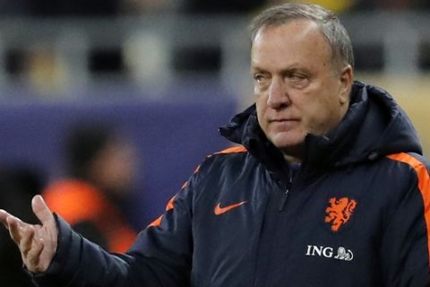 Netherlands' head coach Dick Advocaat gives directions to his players during the international friendly soccer match between Netherlands and Romania on the National Arena stadium in Bucharest, Romania, Tuesday, Nov. 14, 2017. (AP Photo/Vadim Ghirda)