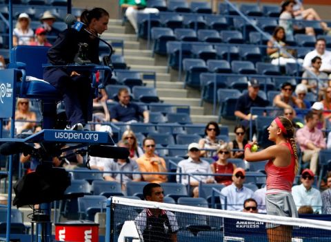 Victoria Azarenka talks with the chair umpire during the first set.